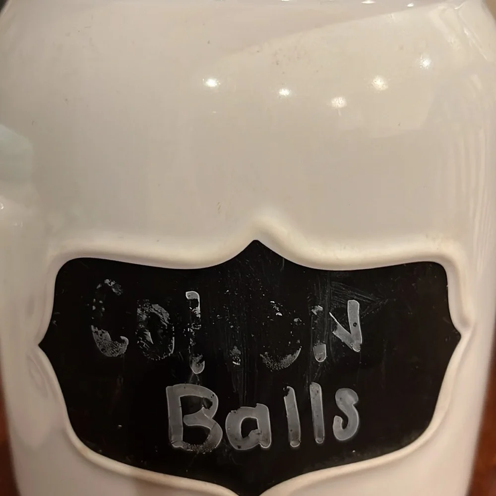 Two ceramic containers with covers and chalkboard labels